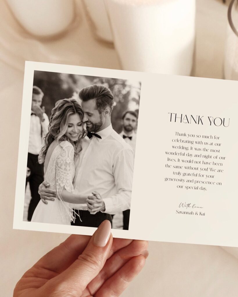 Wedding thank you card with a black and white couple photo and elegant text.